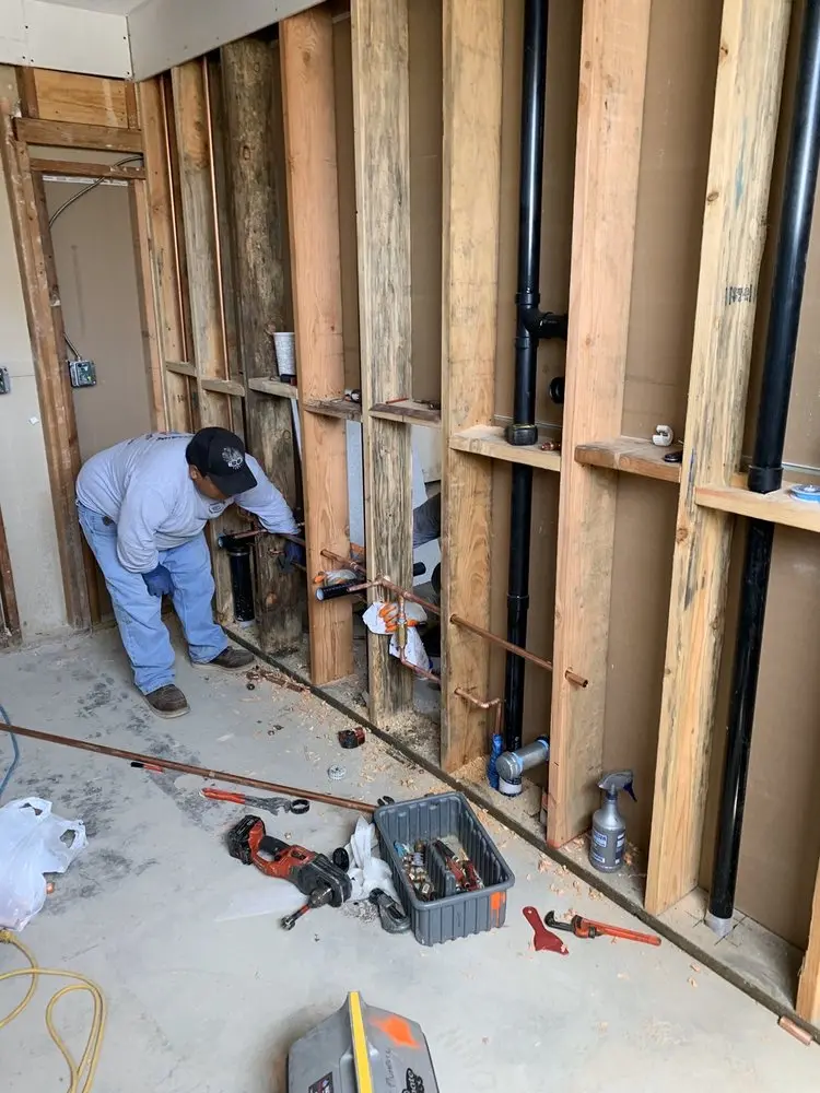 Commercial rough-in plumbing for Water Heater Replacement in Petersburg